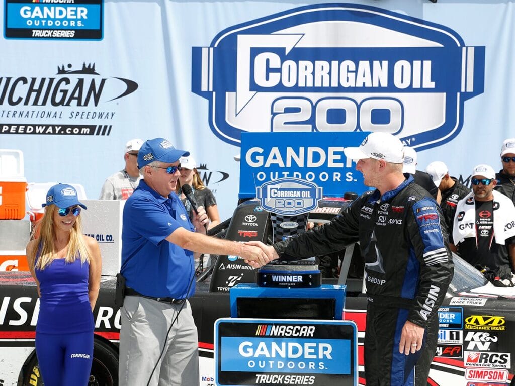 Corrigan Oil presenting Corrigan Oil 200 trophy at Michigan International Speedway