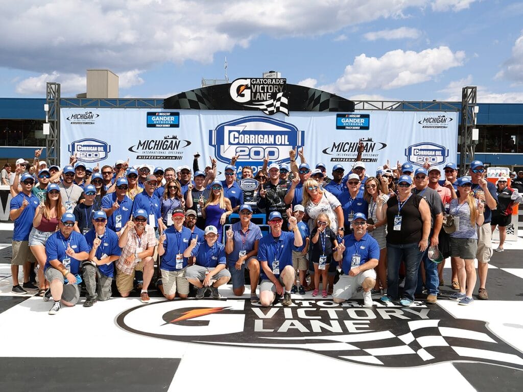 Corrigan Oil team celebrating in NASCAR Gander Outdoors Victory Lane