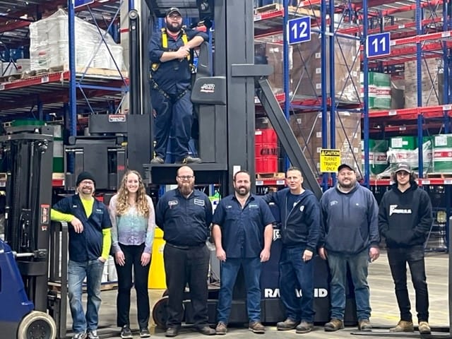 Corrigan Oil team members in our warehouse